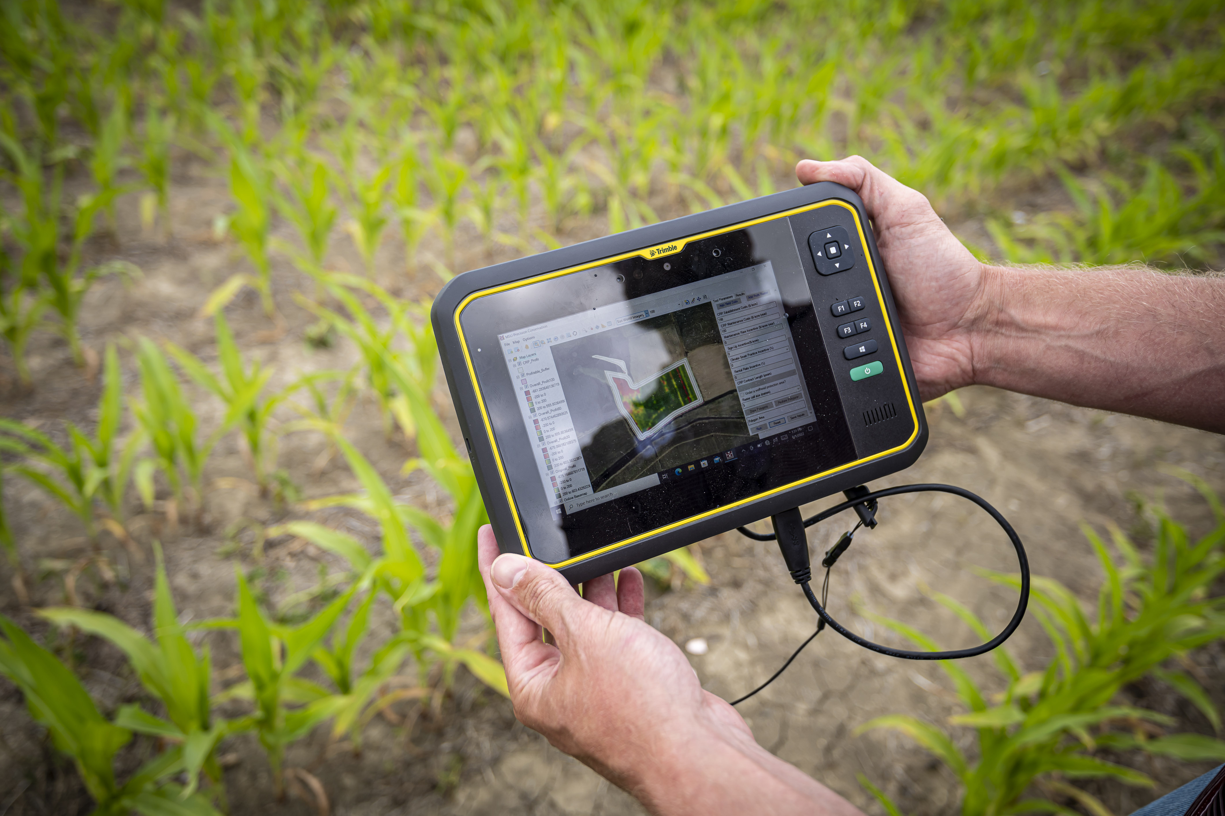 The software, MSU Precision Conservation Tool, identifies precise locations where conservation practices are most economically beneficial to farmers on specific tracts of land. (Photo by David Ammon)