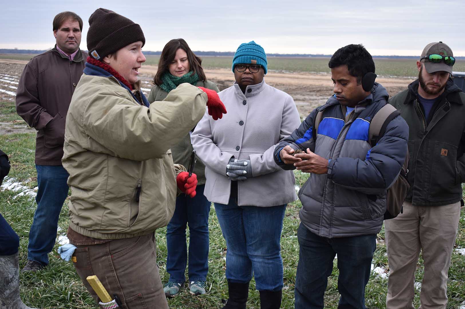 Rachel Stout-Evans, a USDA NCRS resource soil scientist, discusses the soil health of one of the study sites during a cover crop field day in winter 2019. (Photo submitted)