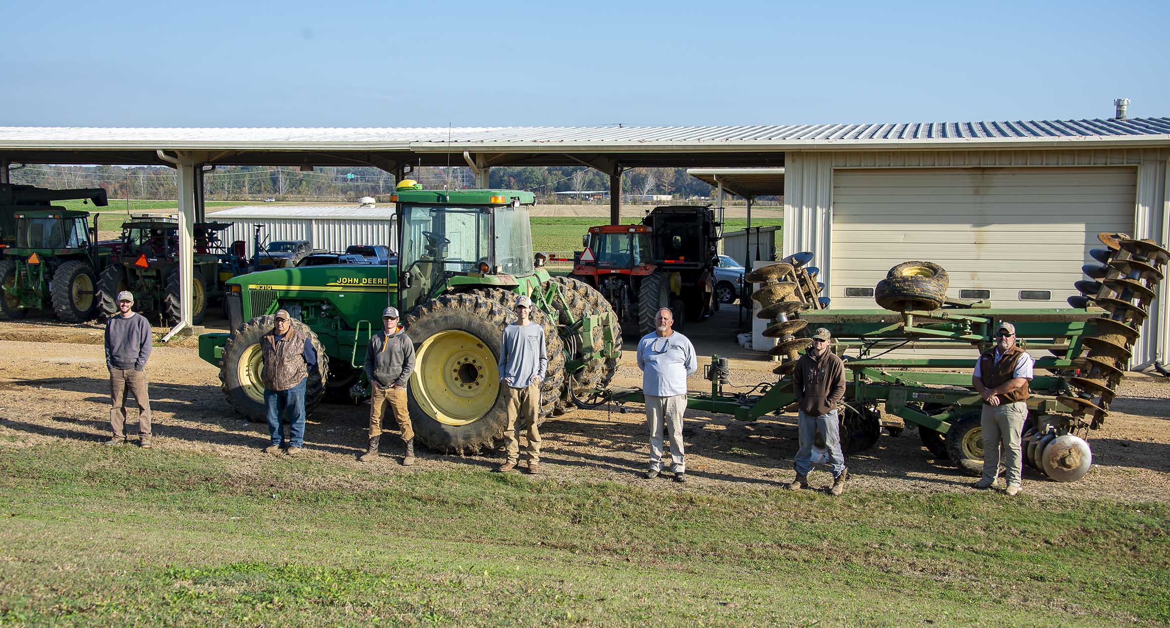 The farm crew includes (left to right) Hayden Carty, John Estes, Brandon Mast, Bailey Simpson, Eddie Stevens, Zach Pitts, and Keith Daniels. (Photo by Karen Brasher)