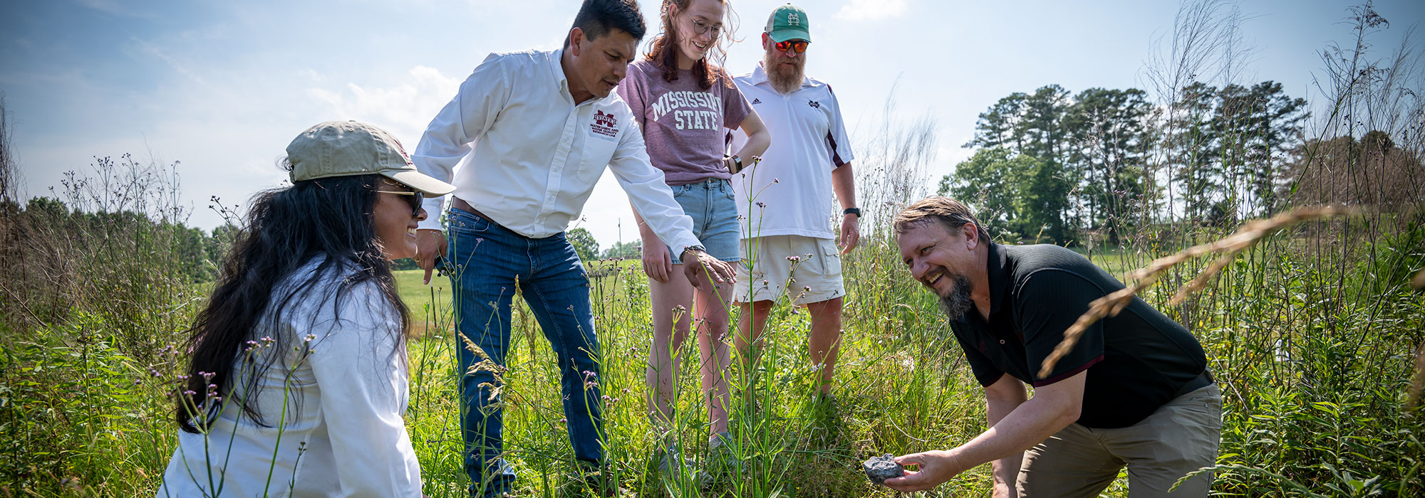 scientists and student sin the field