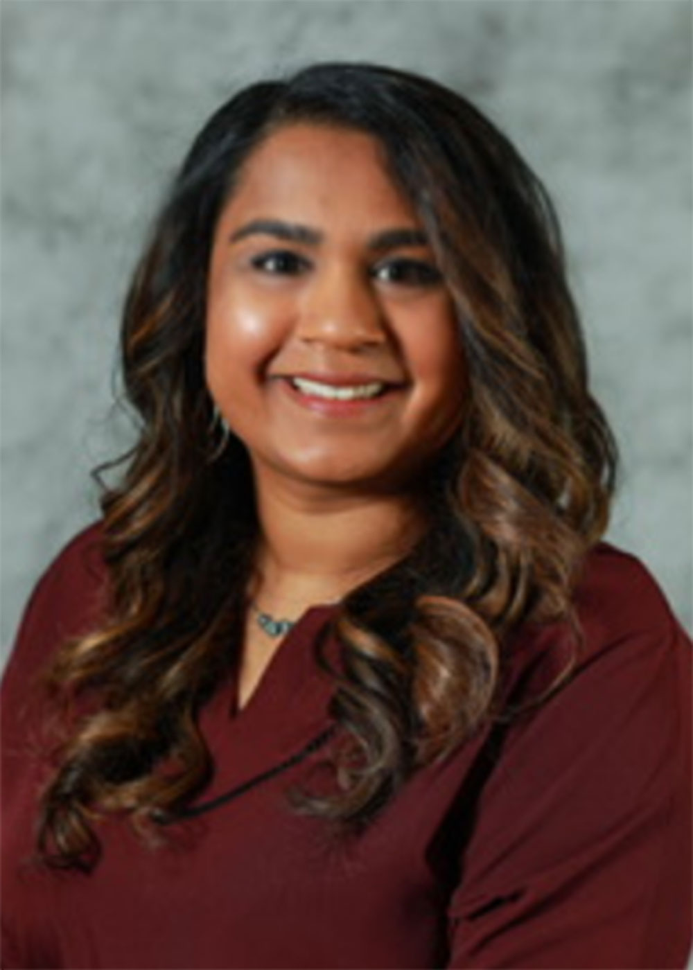 Dr. Genevieve D'Souza