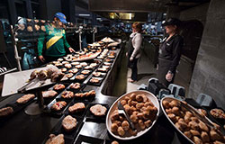 student looking over pastries